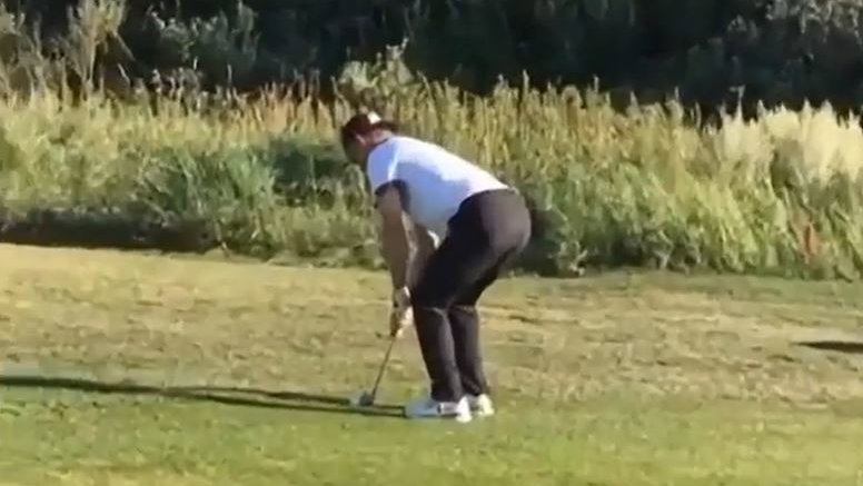 Golfer chips in using HALF a club after snapping it into two pieces